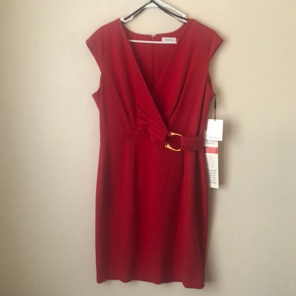 Calvin Klein Dresses & Skirts - NWT. Calvin Klein dress with gold faux buckle.